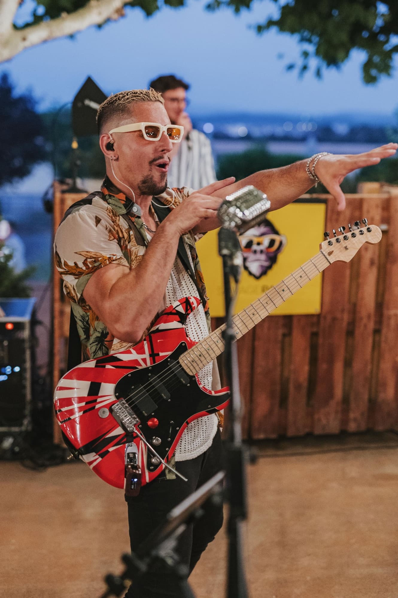 Savage Party live band sax player walking into the crowd at a Barcelona destination wedding